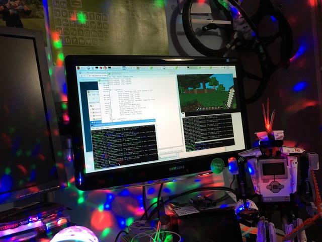 Colourful lighting behind a computer monitor